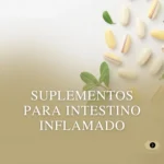 Suplementos para intestino inflamado: Suplementos naturais para intestino inflamado com cápsulas coloridas e folhas verdes saudáveis.